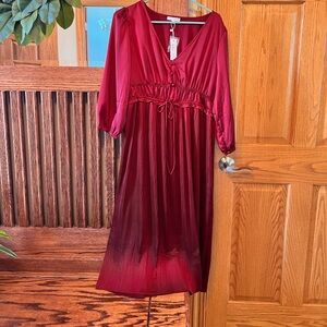 Maroon pleated mini dress.